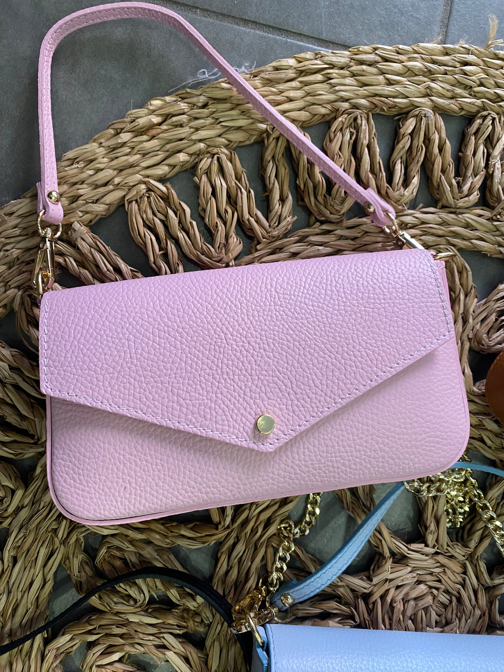 Pochette a busta in pelle