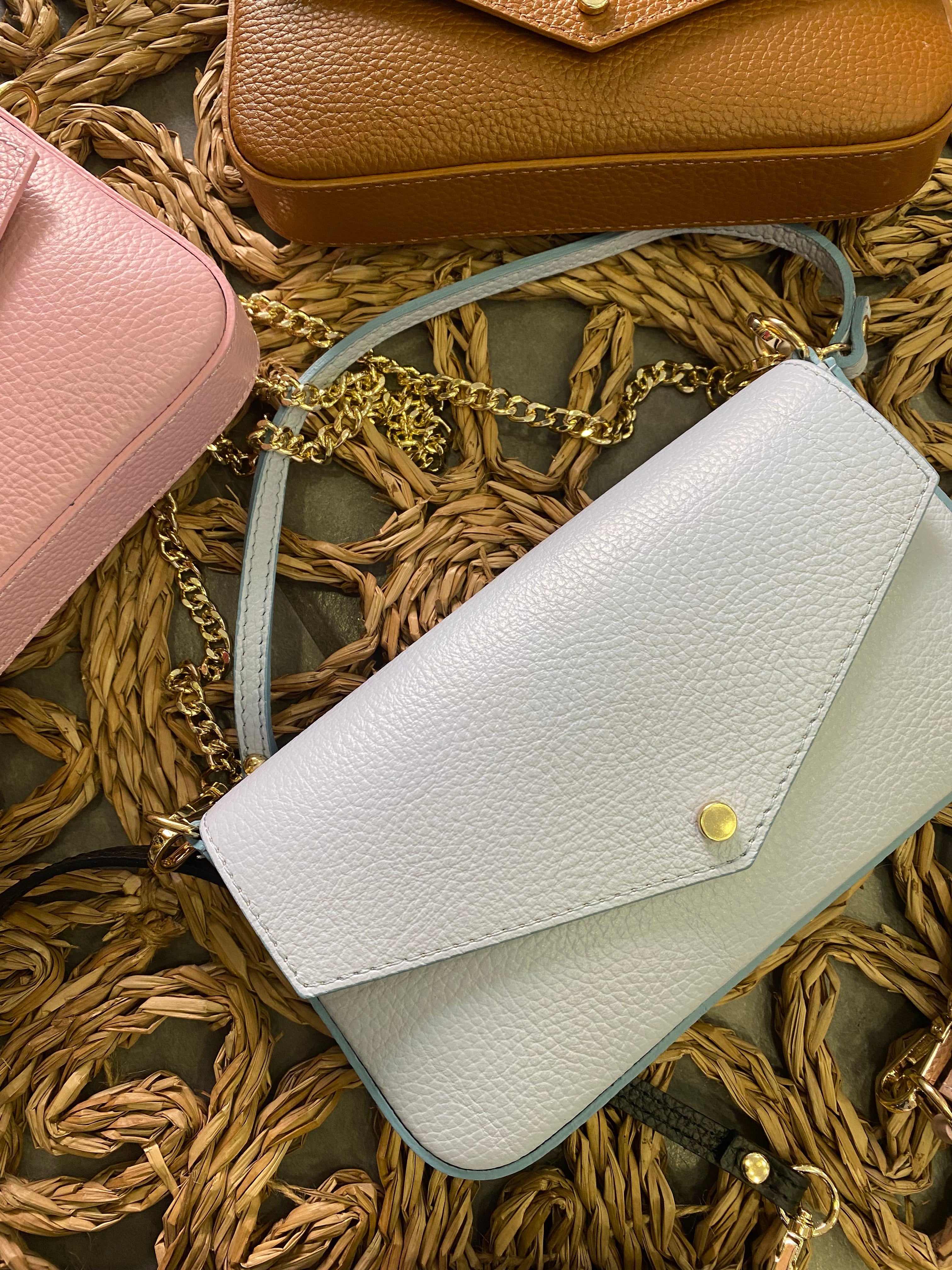 Pochette a busta in pelle