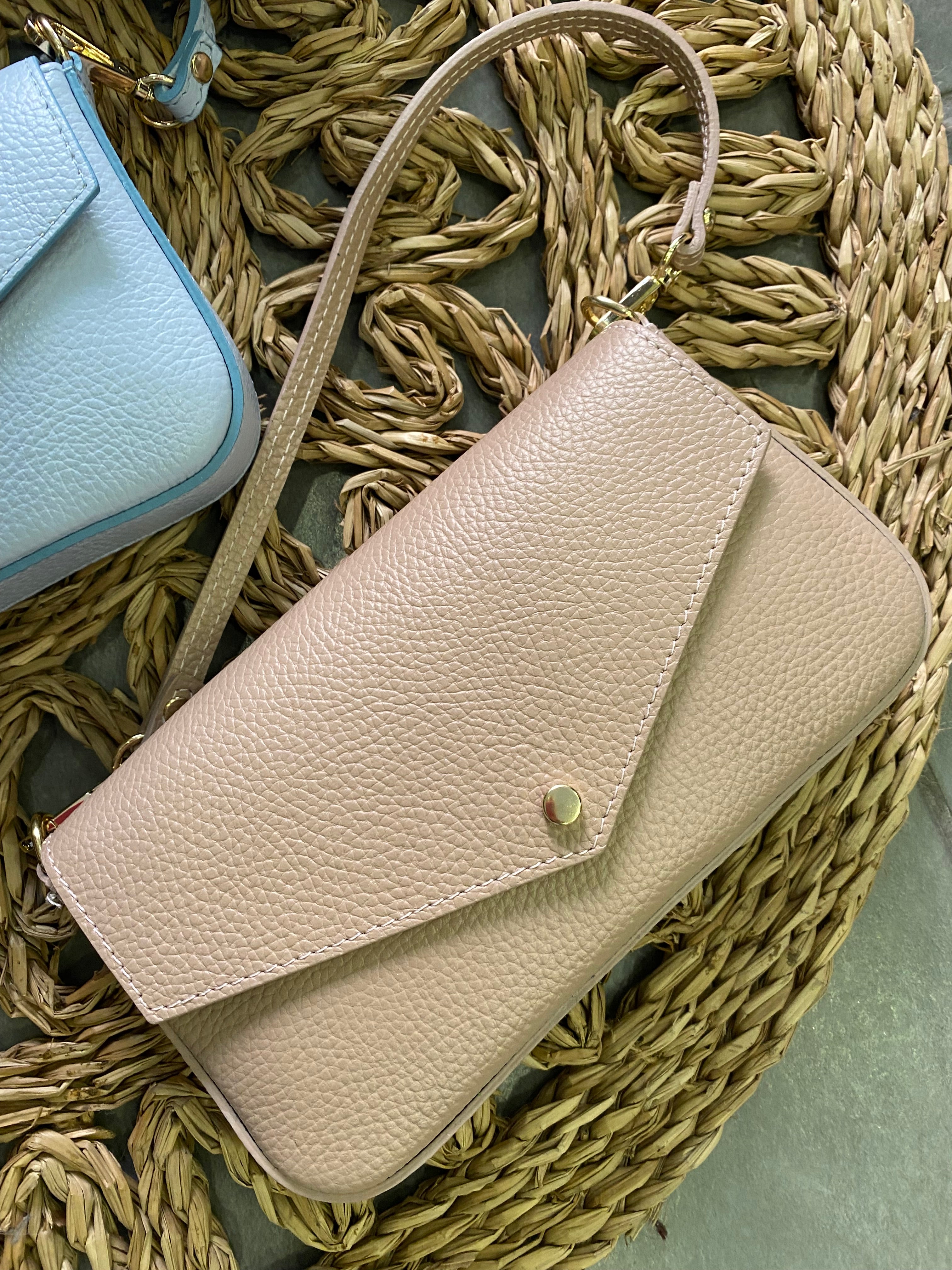Pochette a busta in pelle