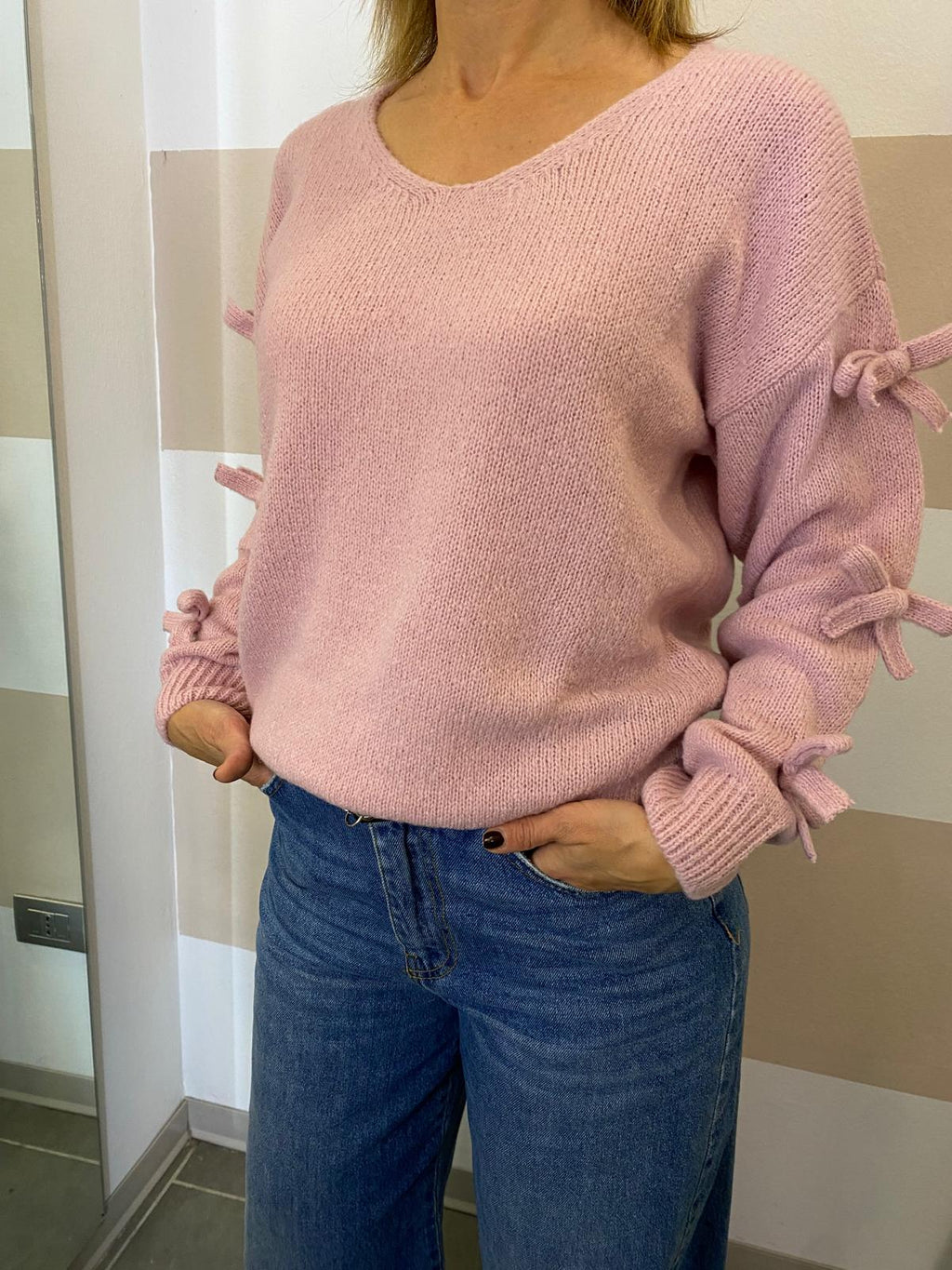 Maglione con fiocchetti Kontatto