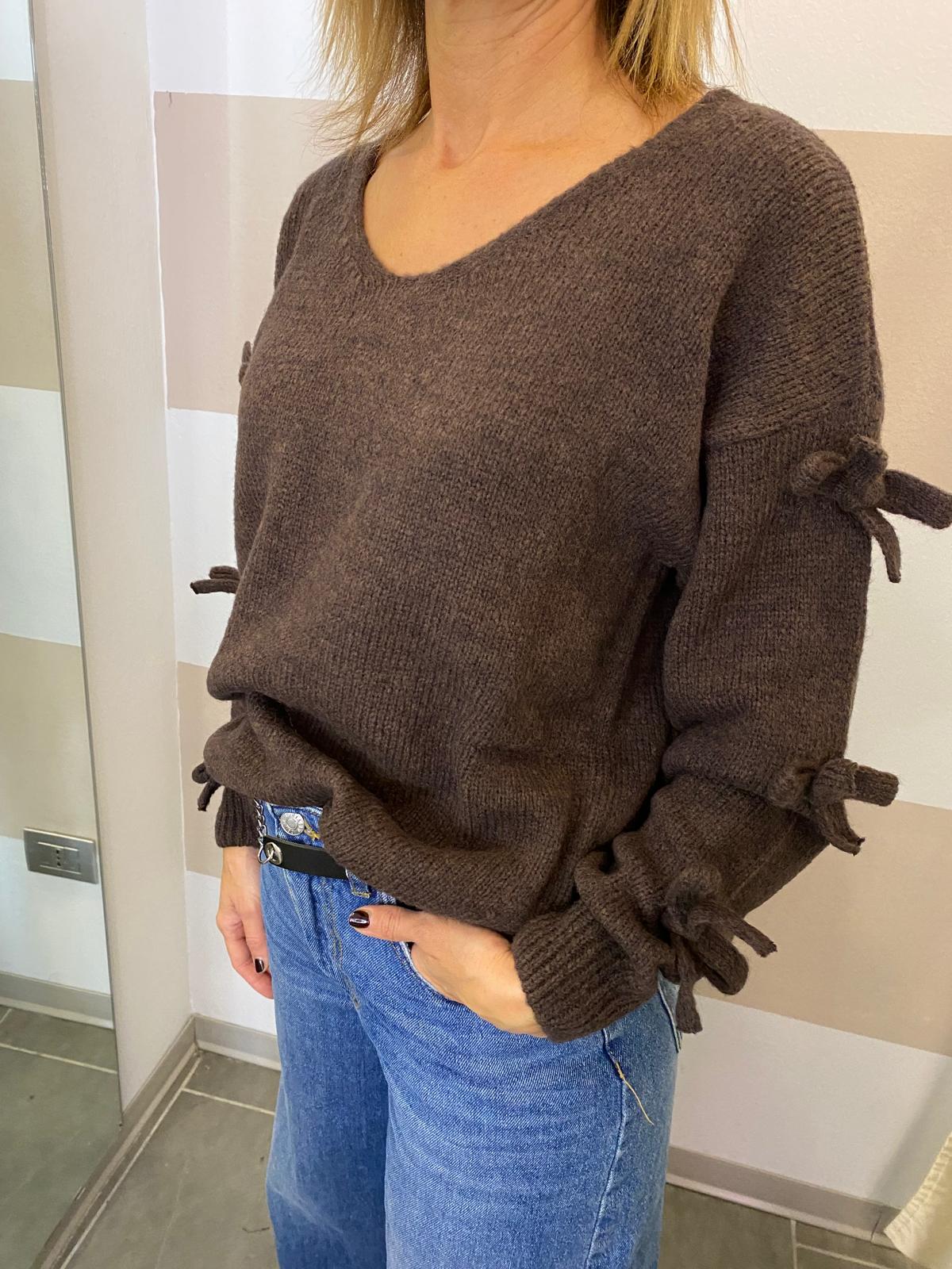 Maglione con fiocchetti Kontatto